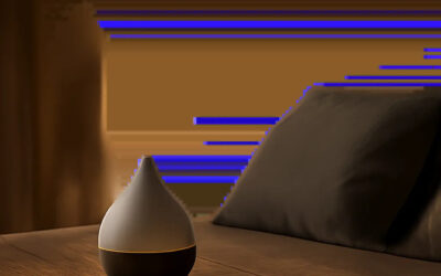 Un diffuseur d’huiles essentielles élégant posé dans une chambre apaisante, pensé pour accompagner le rituel du soir. L’image évoque la détente, le calme et une ambiance propice au sommeil.